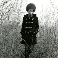 June Jordan Standing in a Field in Wintertime