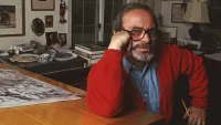 Maurice Sendak Sitting at his Desk Gazing at the Camera